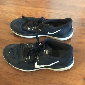 Nike free runs - women’s size 10 - black.